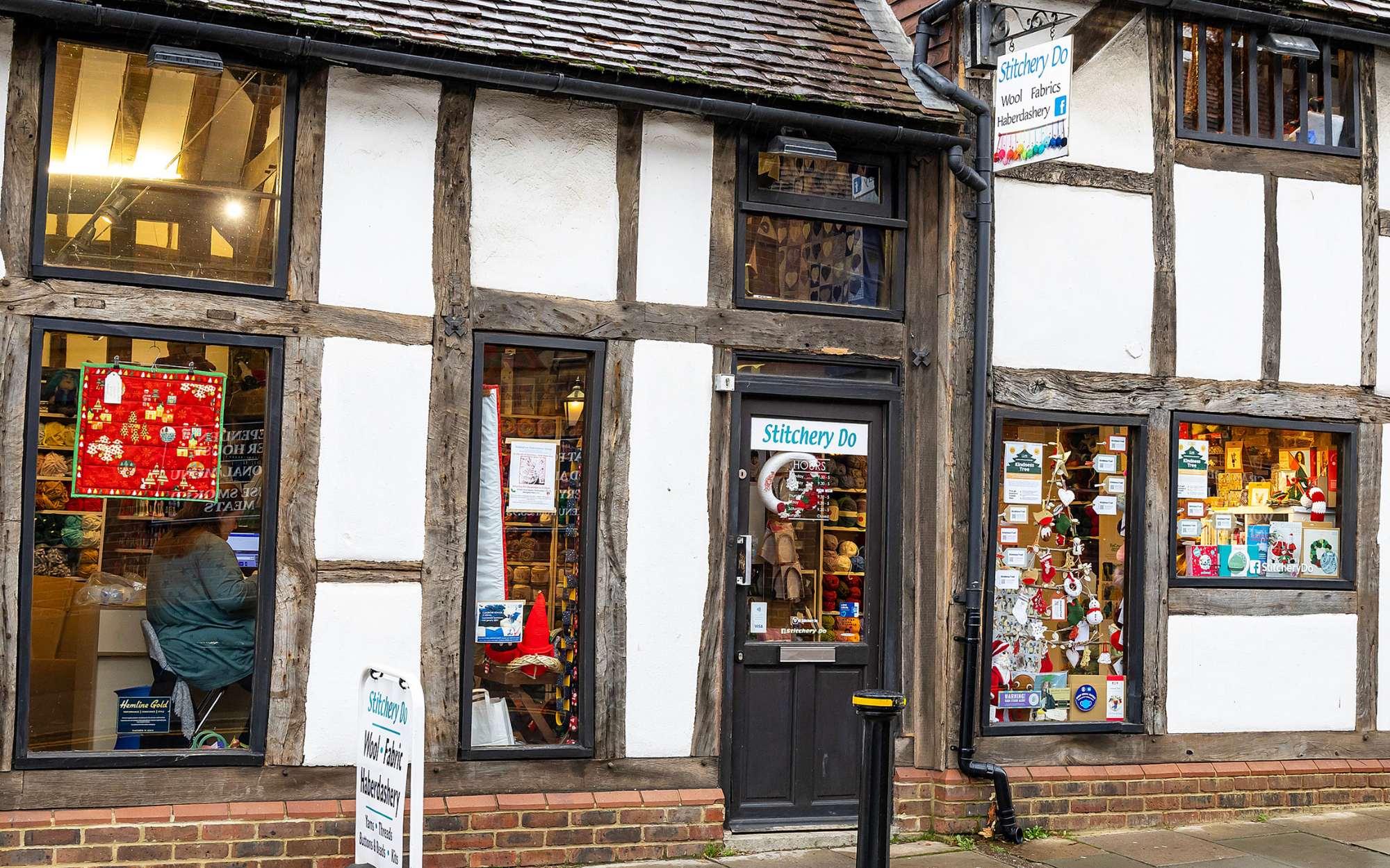 Christmas window display of Stitchery Do