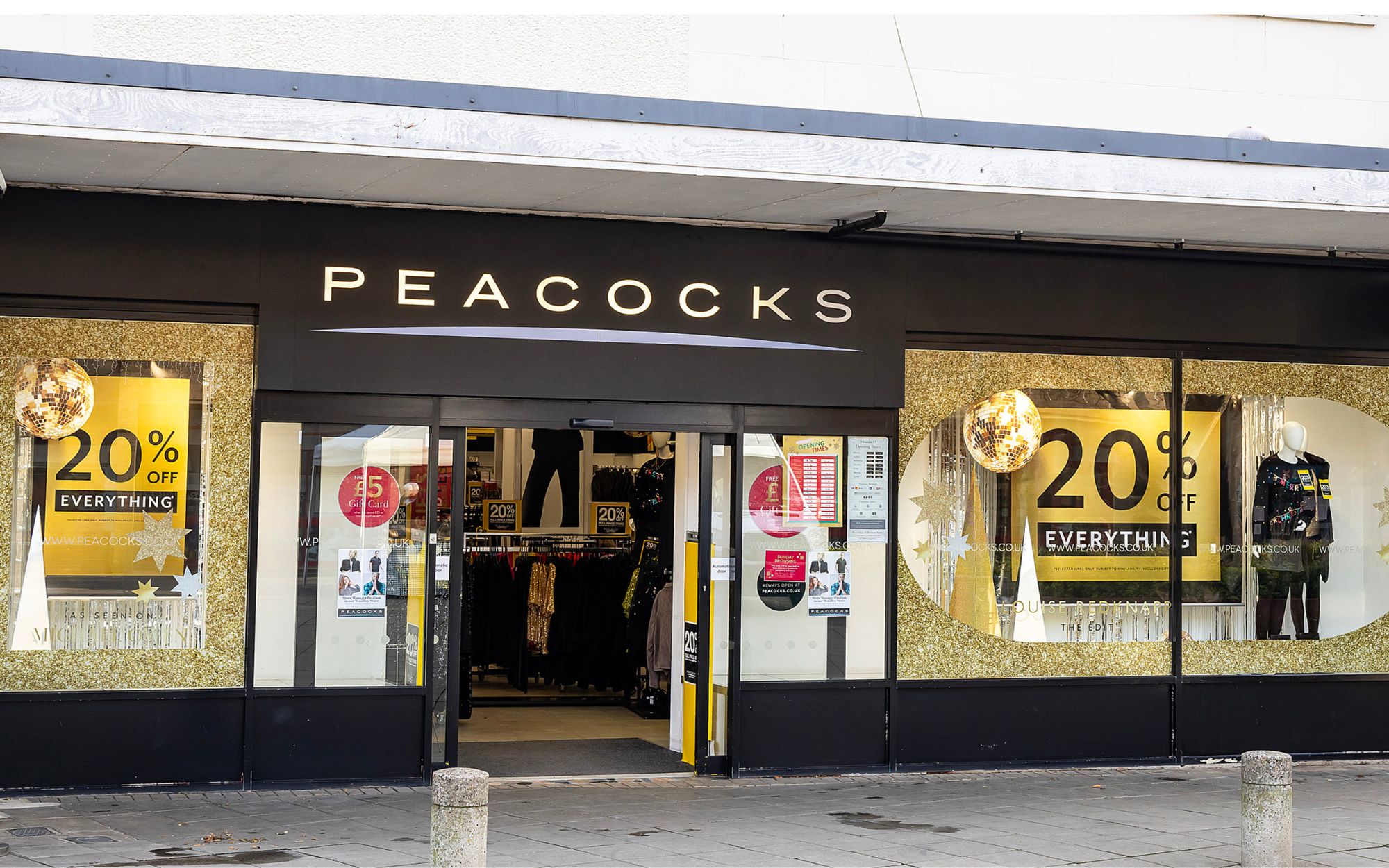 Christmas window display of Peacocks