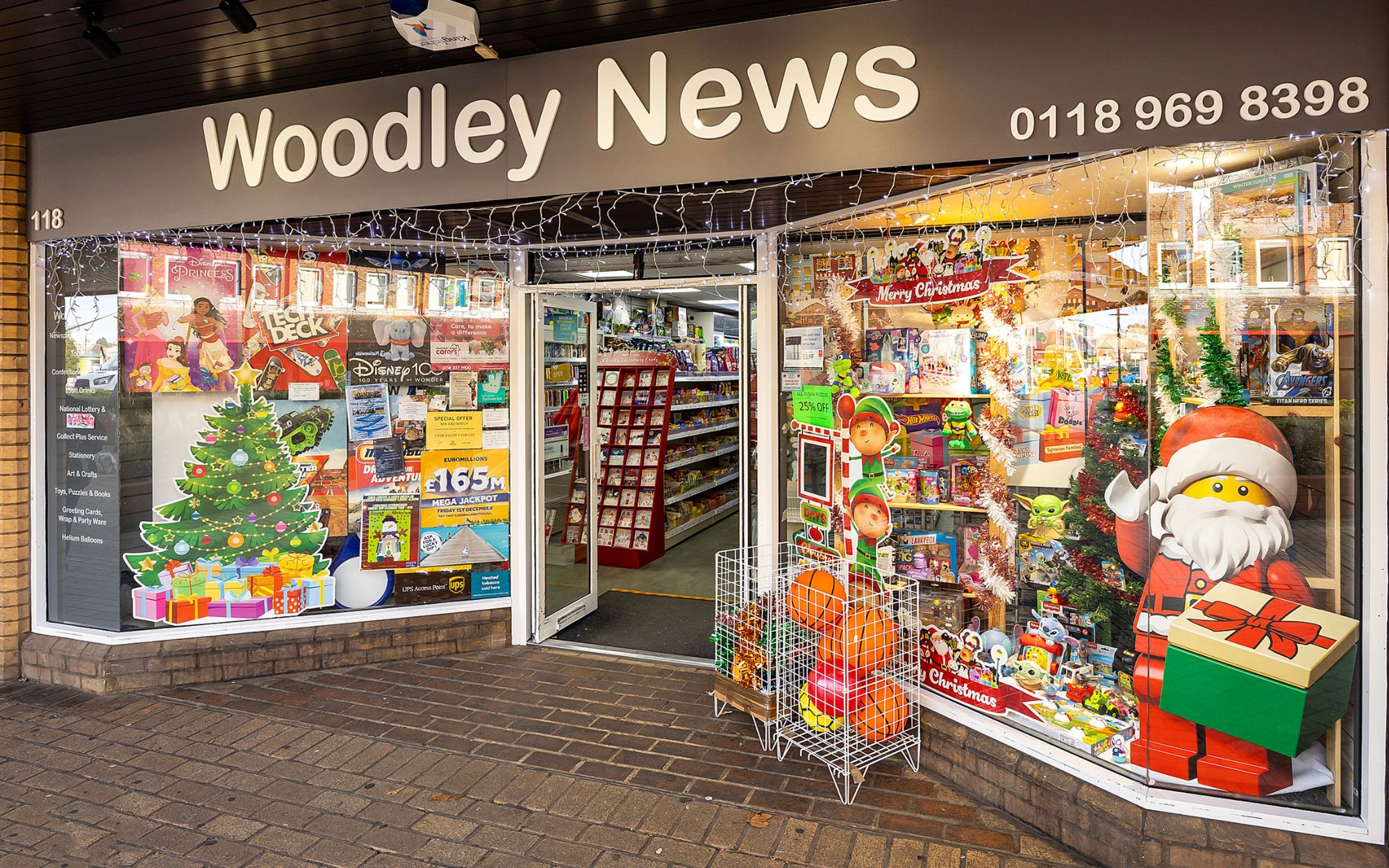 Christmas window display of Woodley News