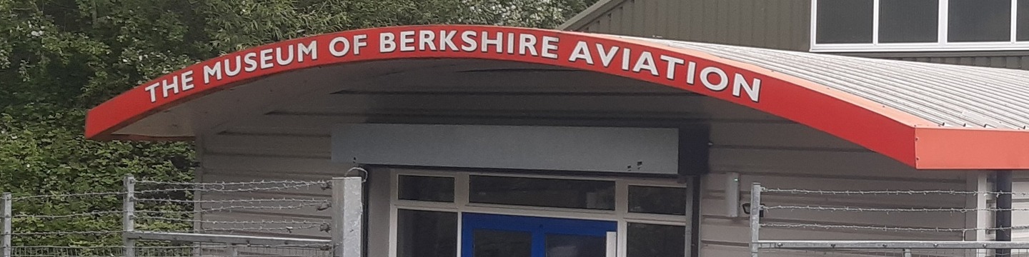 Image of the front entrance of the museum, with a sign that reads 'The Museum of Berkshire Aviation'