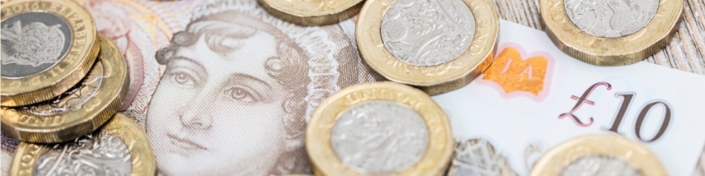 image of a £10 note and some £1 coins