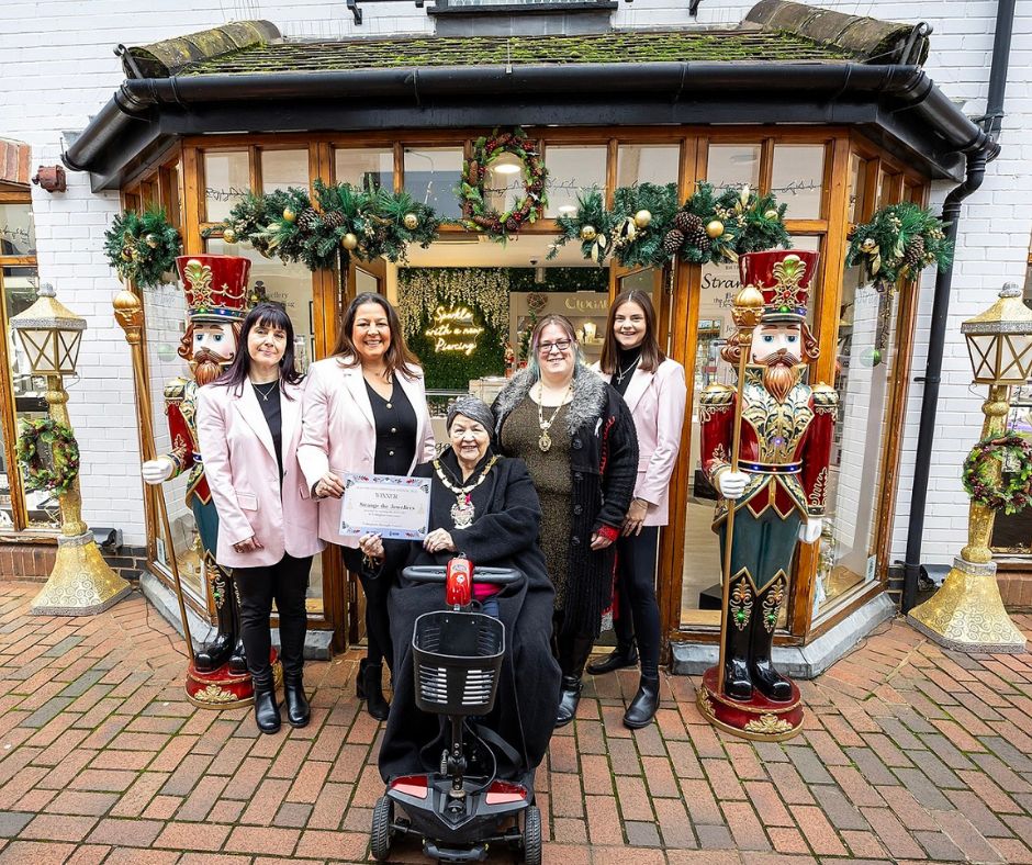 Representatives of Strange the Jewellers received an award certificate from Borough Mayor Cllr Beth Rowland with Wokingham Town Mayor Councillor Sally Gurney